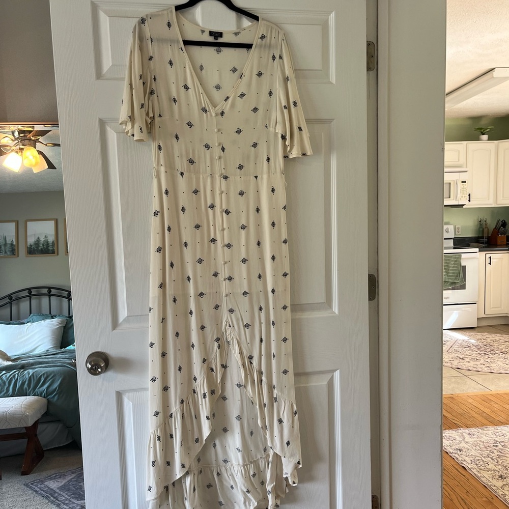 Lira Cream Maxi Dress with Navy Floral Print and High-Low Ruffle